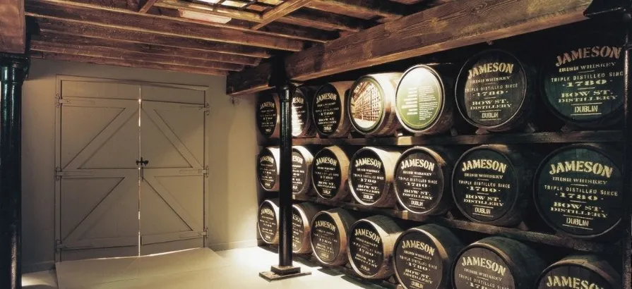 Jameson casks stacked on top of each other in Jameson warehouse