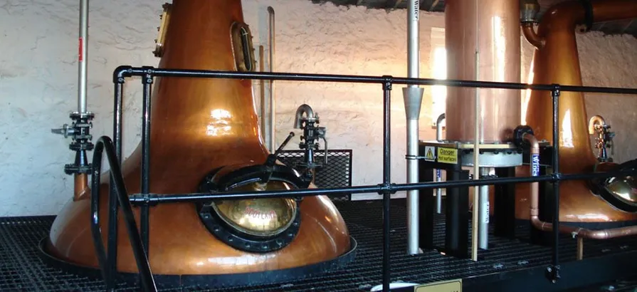 Two copper pot stills in Daftmill still house