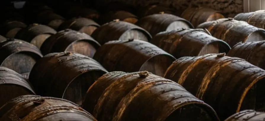 Close view on barrels inside Otard warehouse