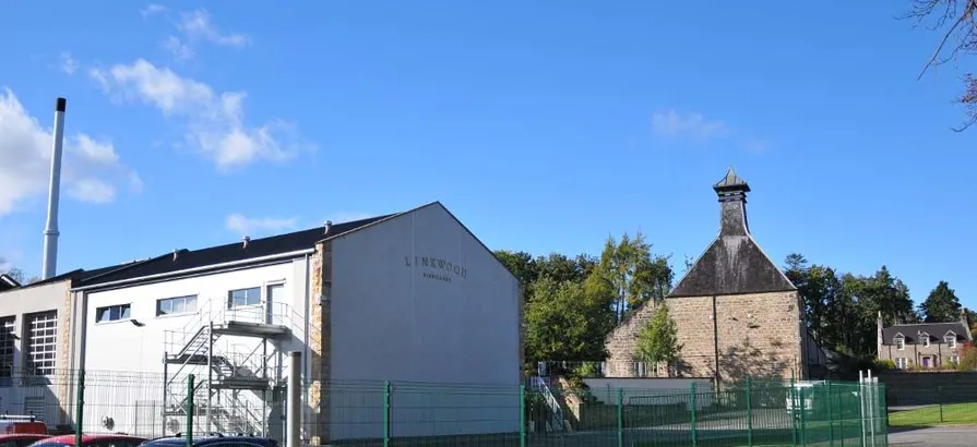 Overlooking the whole area of Linkwood distillery with blue sky in the background