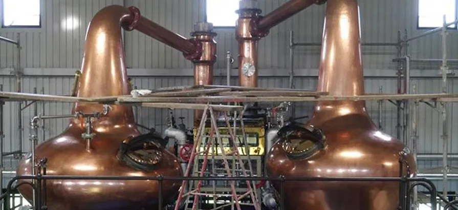 Two onion-shaped copper pot stills in Chichibu still house