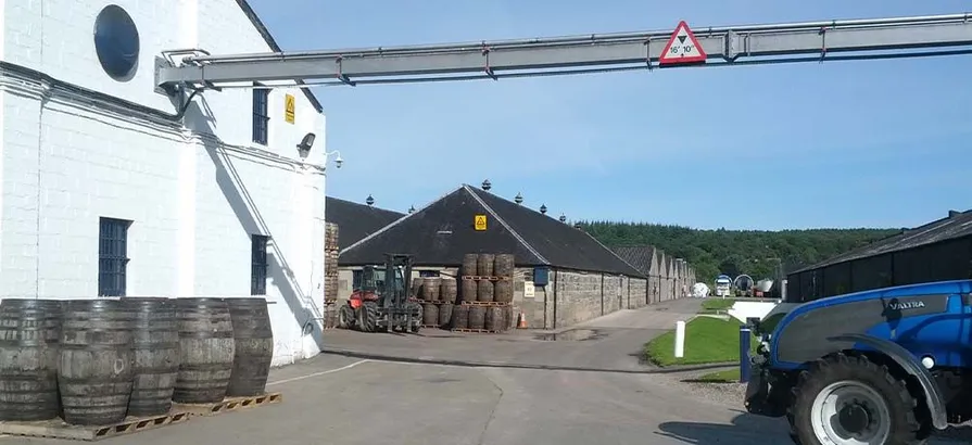 Casks and transport vehicle outside of Glen Moray's warehouses