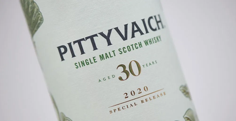 A label of Pittyvaich 30 years old single malt scotch with green background