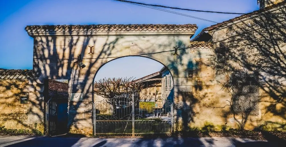 Tree shadow on the gate to Jean-Luc Pasquet mansion