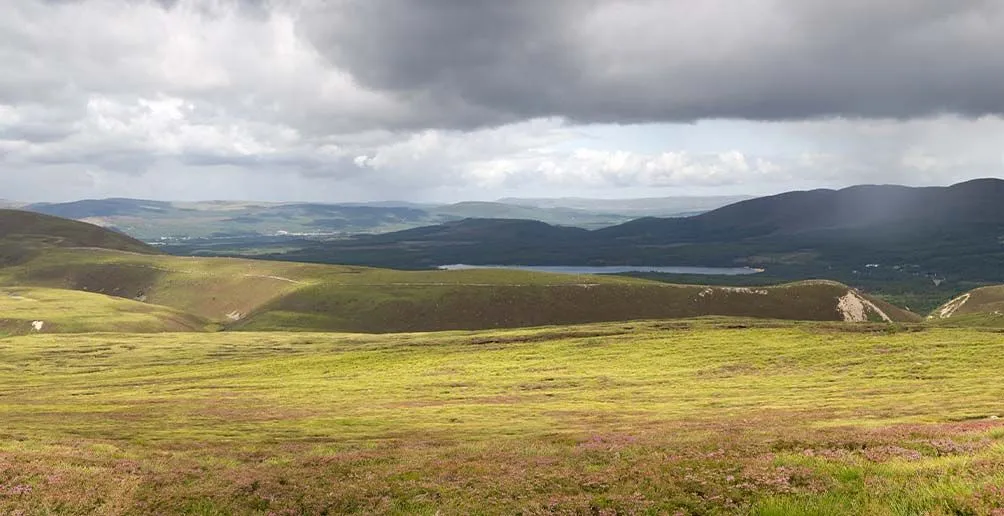 Landscape picture of Speyside region with rolling hills taken on a cloudy day