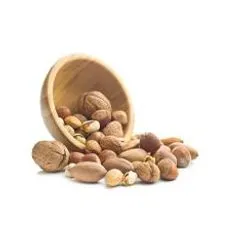 Selection of nuts flowing from bowl