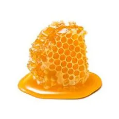 Honey running down honeycomb